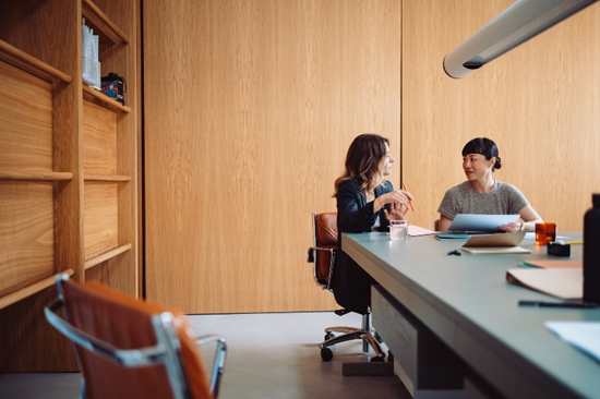 Two female employees in executive coaching 1 on 1 session